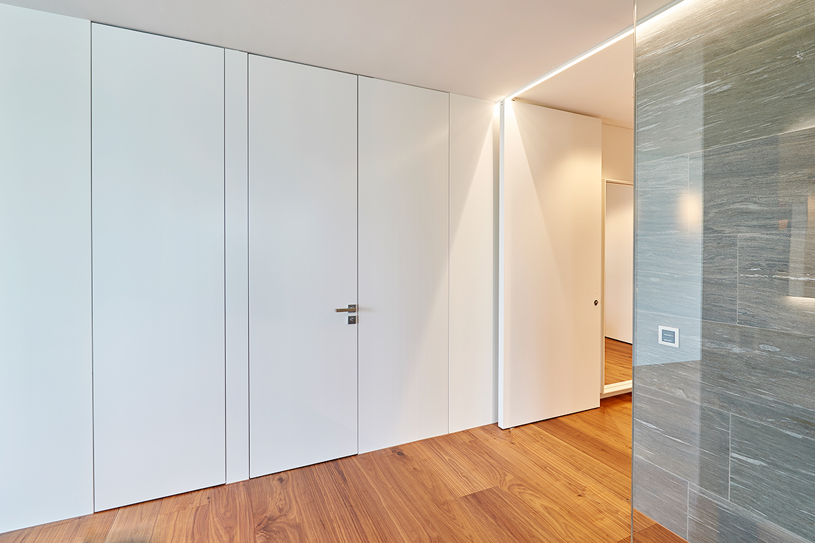 Rahmenlose Türen aus Holz – Pivot-Türsystem - Frank - Frank Türen AG